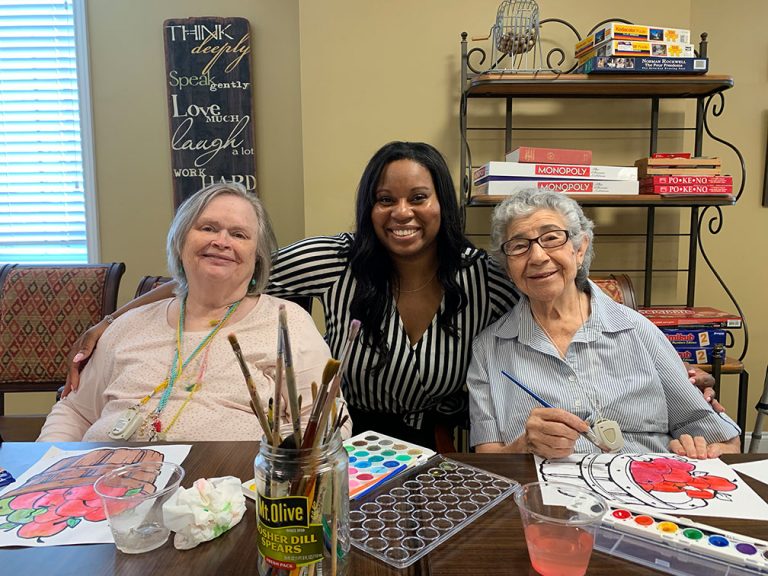 Bridgewood Gardens | Senior living residents enjoying painting activity