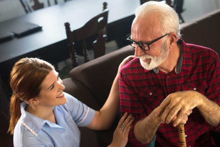Pegasus Senior Living | Caregiver comforts a resident