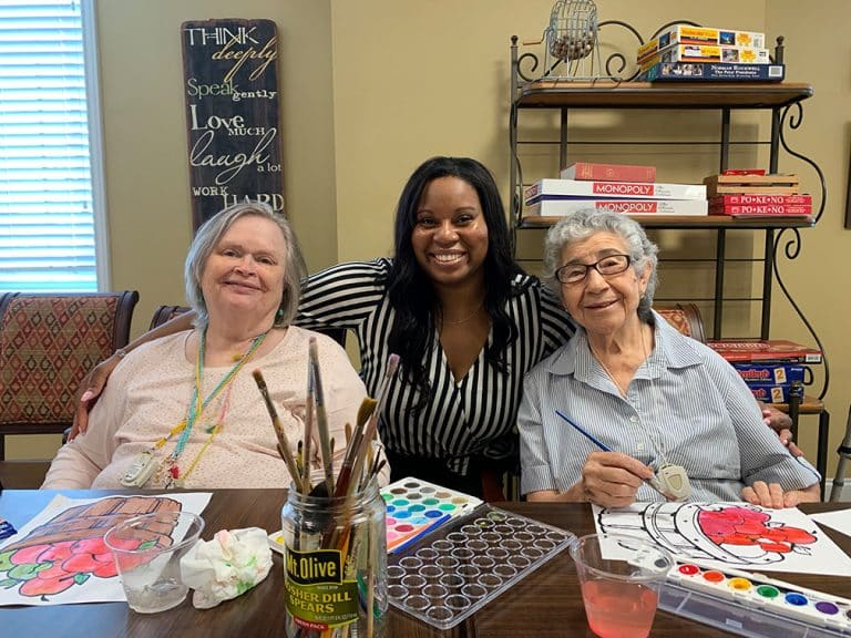 Pegasus Senior Living | Senior residents enjoying painting activity