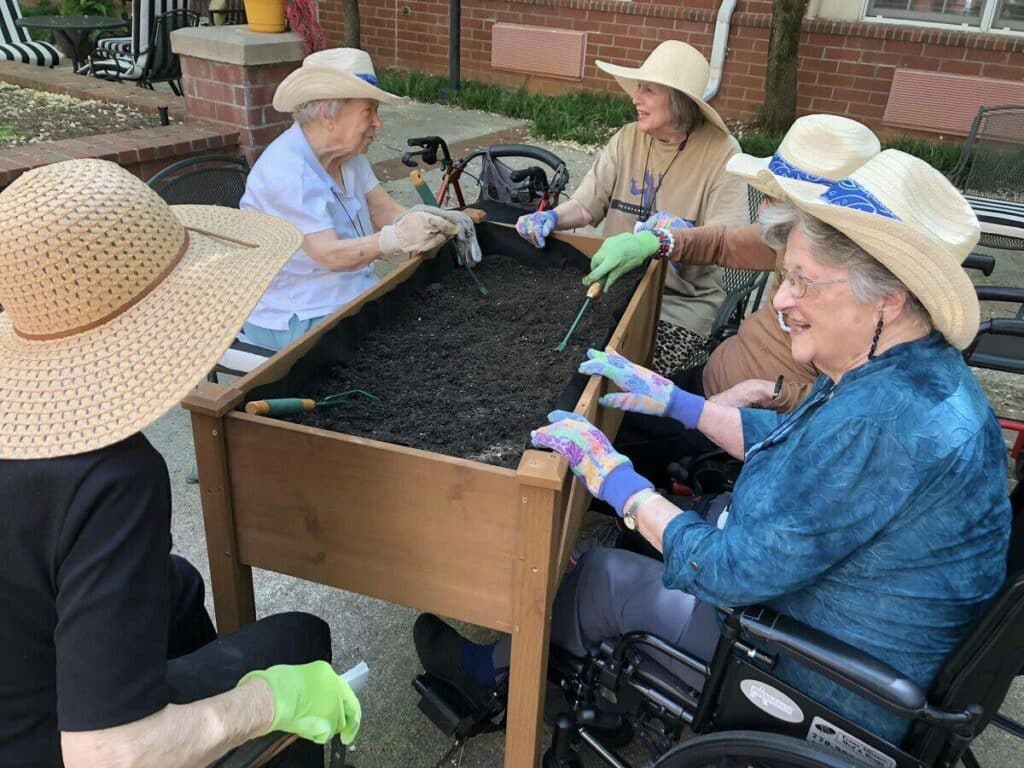 Magnolia Place of Roswell | Residents gardening