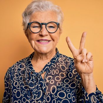 Parmer Woods at North Austin | Woman holding up two fingers