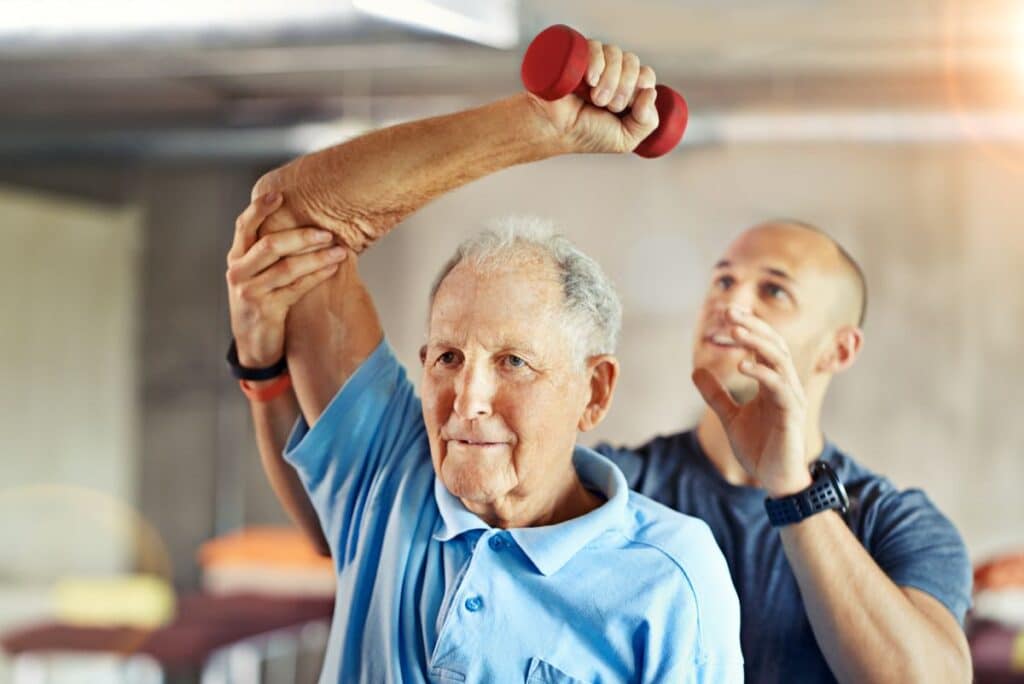 Pegasus Senior Living | Senior exercising with trainer