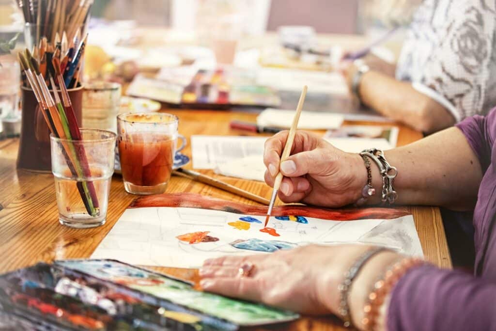 Pegasus Landing of Mesa | Seniors painting at table