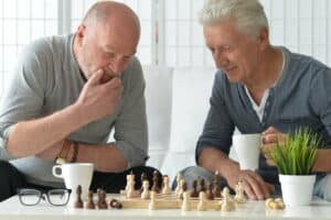 Pegasus Landing of Overland Park | Senior men playing chess