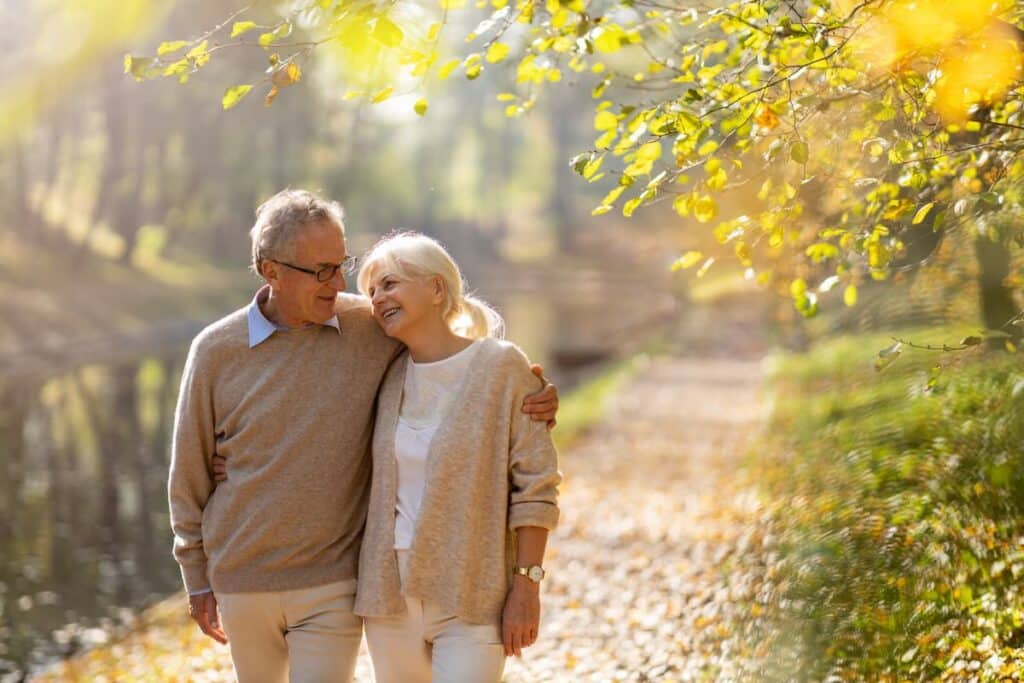 Pegasus Landing of Overland Park | Senior Couple walking through park