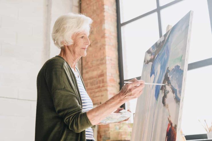 Pegasus Landing of Overland Park | Senior woman painting