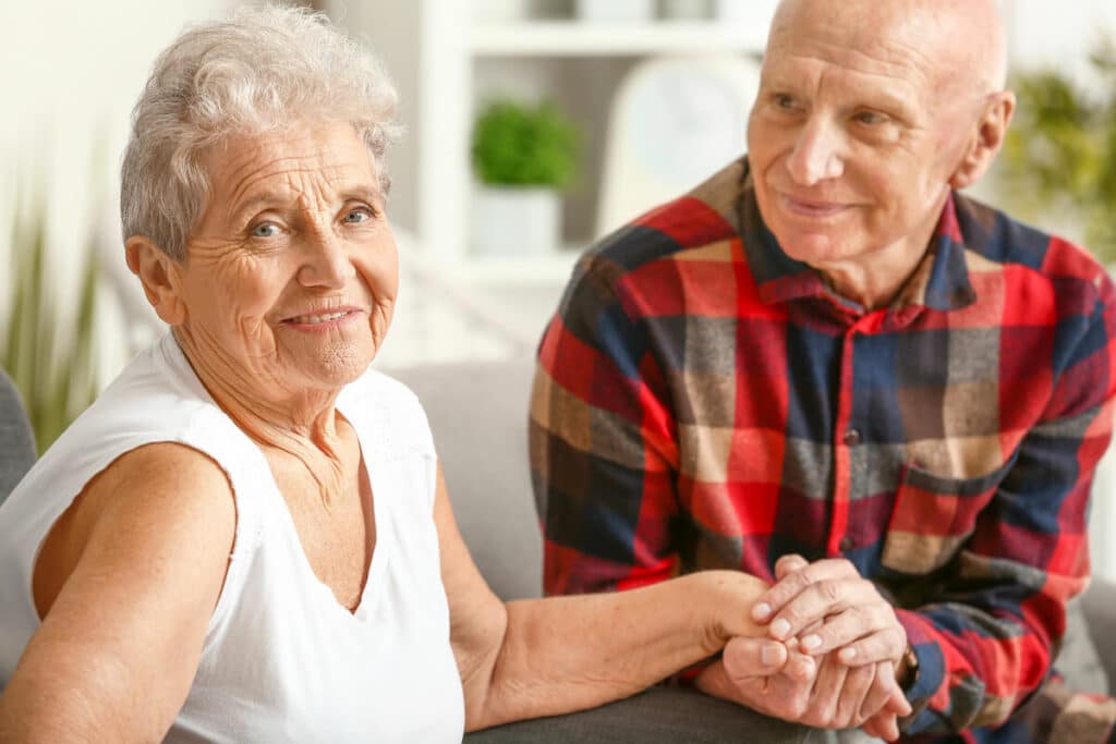 Pegasus Landing of Tanglewood | Happy senior couple holding hands