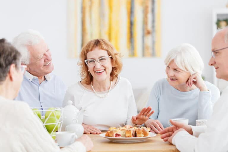 Pegasus Landing of Tanglewood | Seniors having snacks and talking