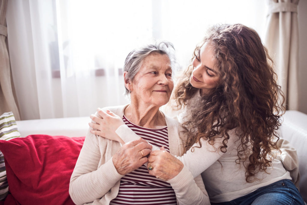 The Courtyards at Mountain View | Woman comforting grandmother