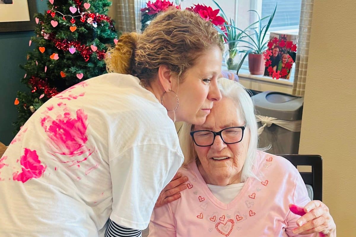 Pegasus Senior Living | Melissa S. makes a t-shirt with her mother Reva during a meaningful craft time in memory care at The Legacy at Cimarron.