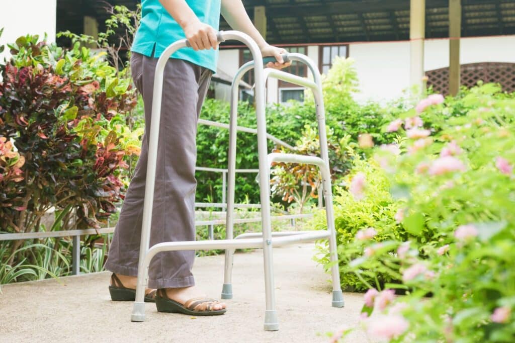 The Legacy at Cimarron in El Paso | Senior using a walker