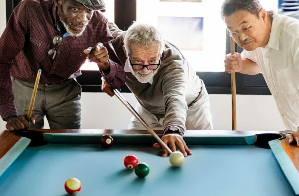 The Legacy at Cimarron in El Paso | Seniors playing pool