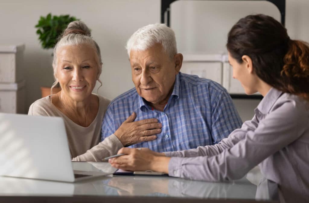 The Legacy at Crystal Falls in Leander | Older couple discussing options for senior living