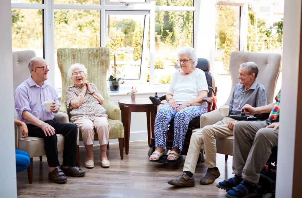 The Legacy at Crystal Falls in Leander | Seniors sitting in a circle and talking