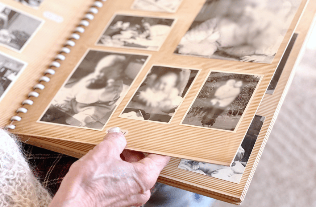 The Legacy at Crystal Falls in Leander | Woman looking at a photo album