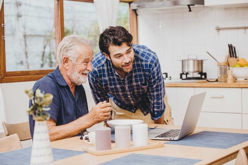 The Legacy At Falcon Point | Happy Senior Man With Adult Son