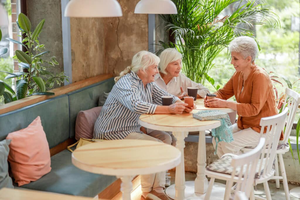 The Legacy at Forest Ridge | Happy senior women having coffee