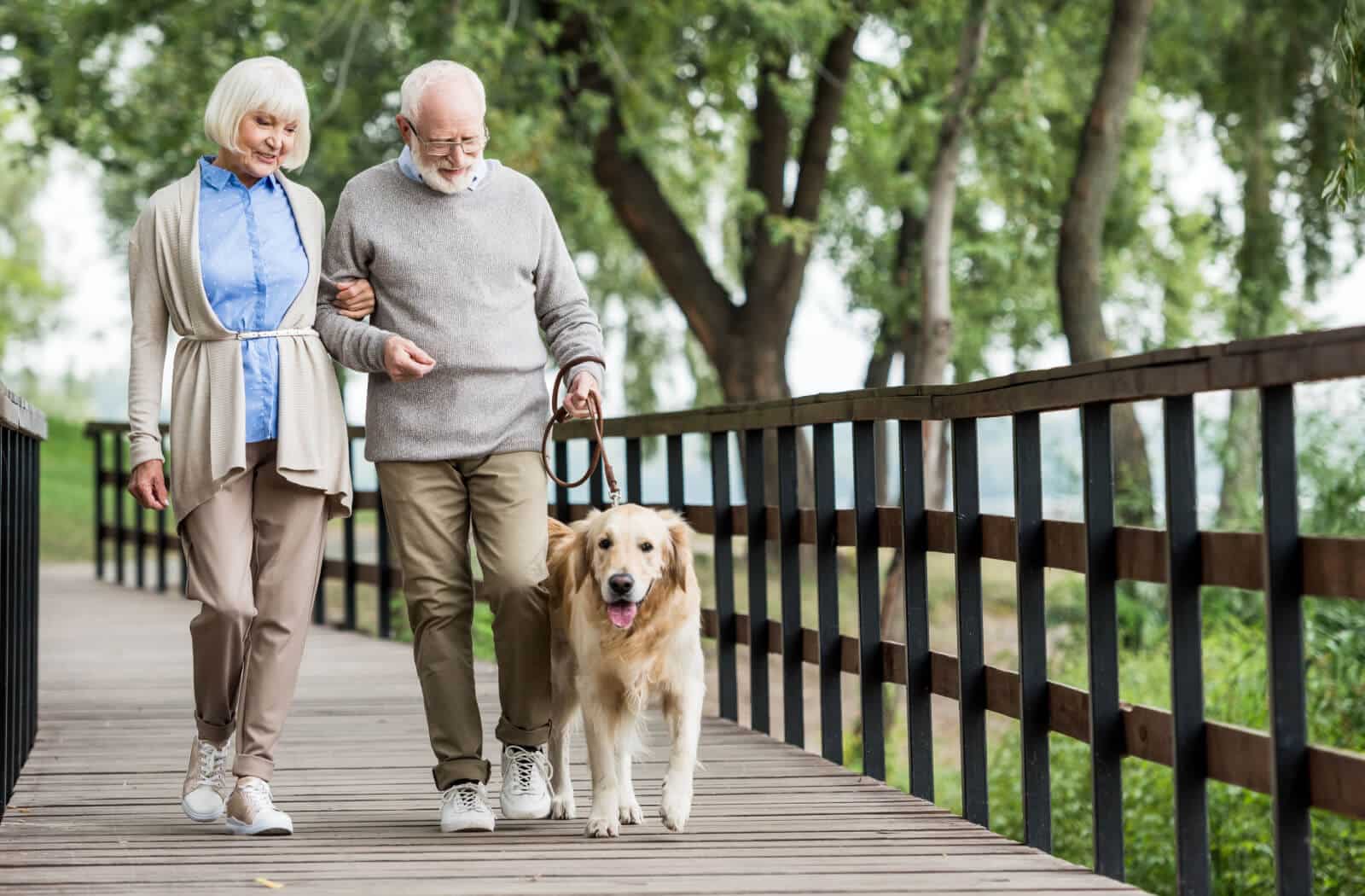 Pegasus Senior Living | Senior couple walking their dog