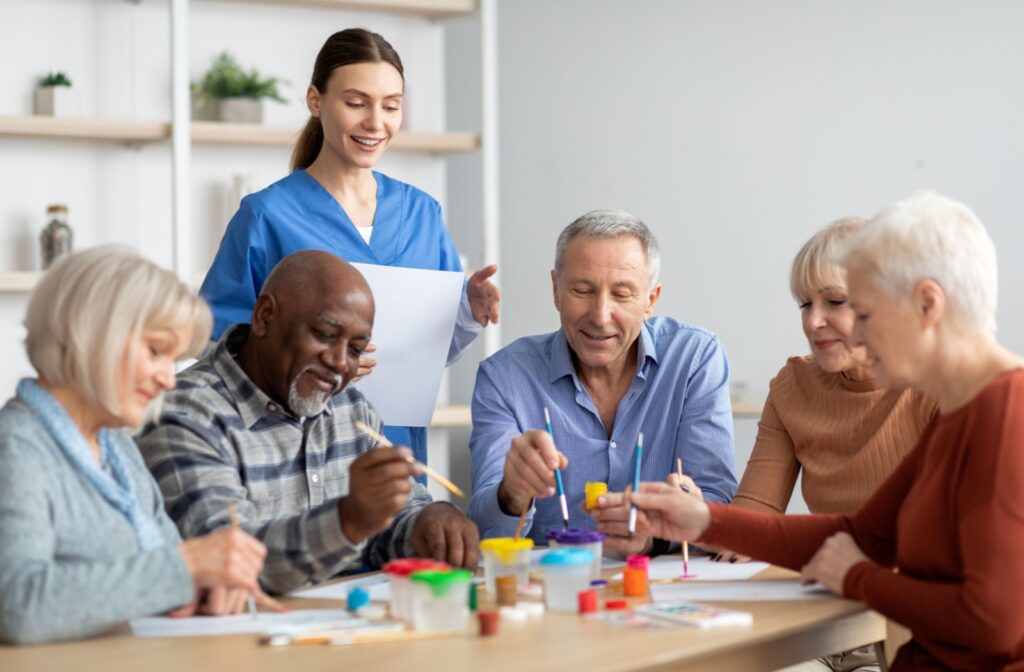 Pegasus Senior Living | Group of seniors making arts and crafts