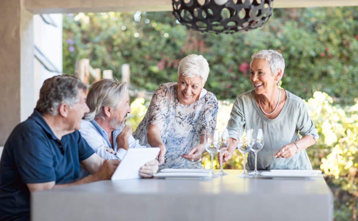 Pegasus Senior Living | Group of seniors eating outside