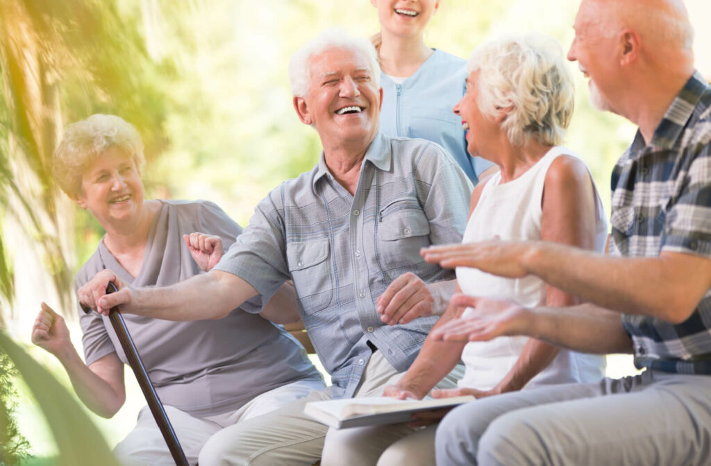 The Legacy at South Plains | Seniors enjoy a conversation outdoors