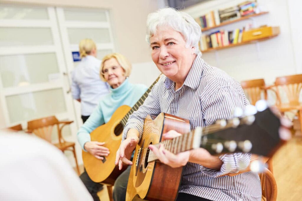 The Legacy at South Plains | Seniors playing music together