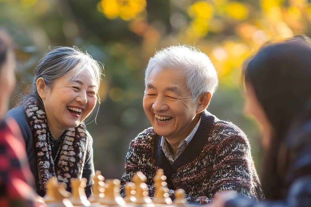 The Legacy at Town Square | Happy Senior Couple Play Chess Outdoors