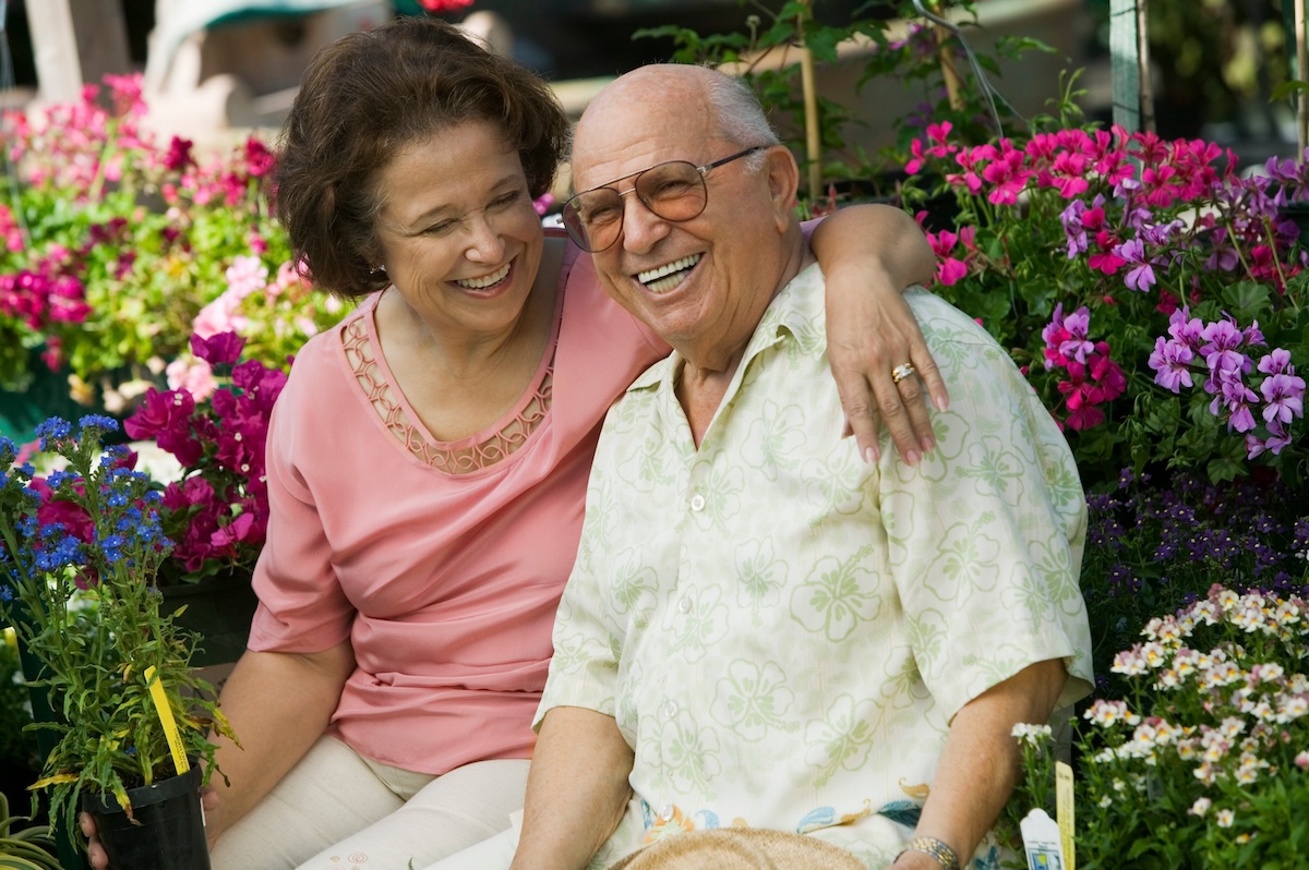 The Oaks at Inglewood | Seniors laughing in a garden