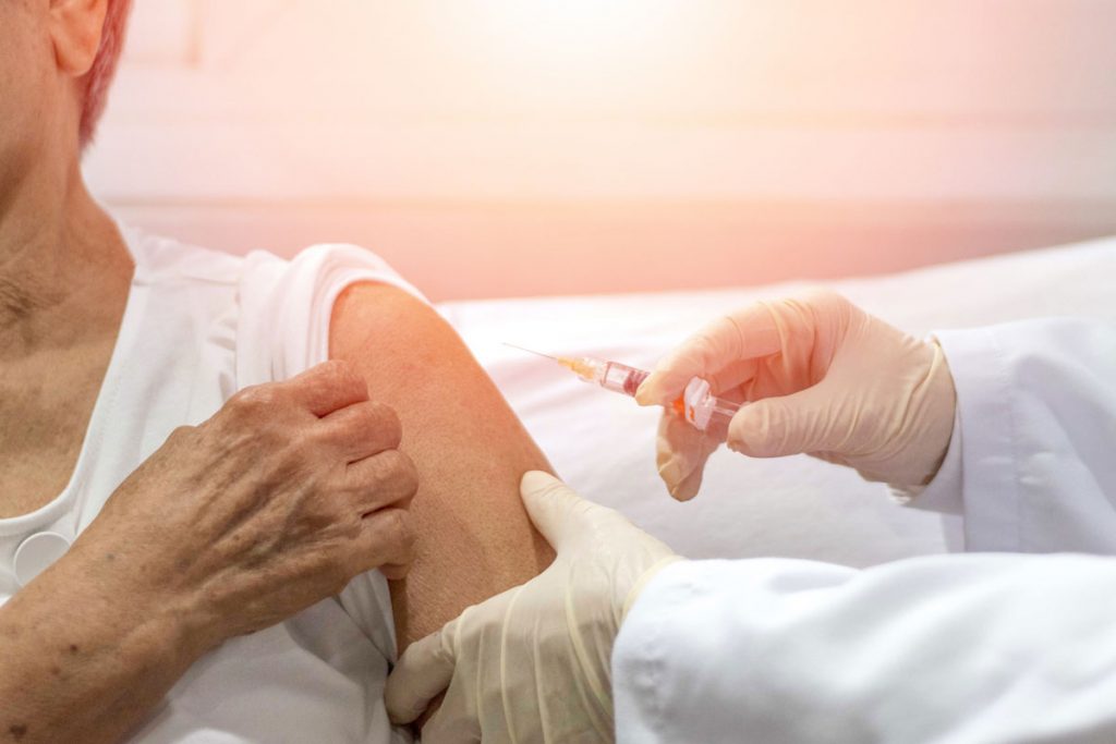 The Renaissance of Florence | Senior woman receiving a flu shot