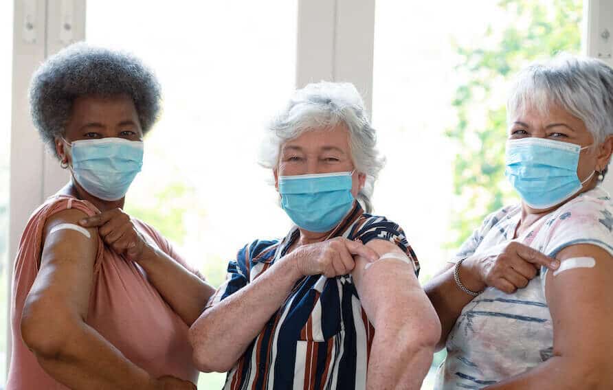 Pegasus Senior Living | Seniors showing they got a booster shot