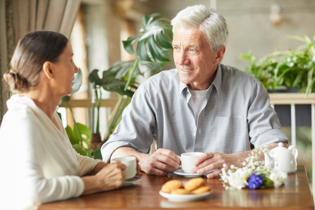 Town Village Crossing | Seniors in cafe