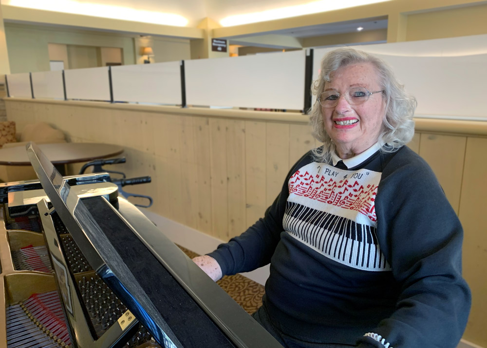 Pegasus Senior Living | Senior woman playing piano