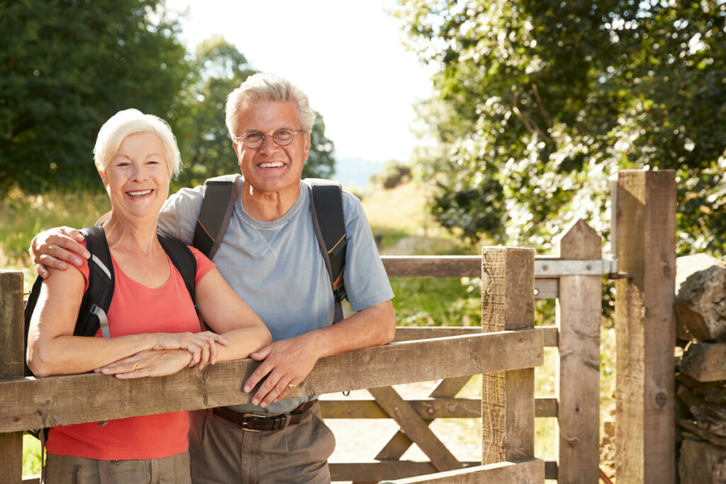 The Seasons of Reno | Happy, active senior couple out on a hike