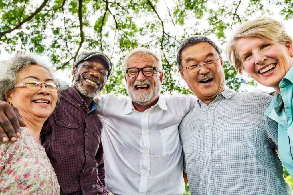 Pegasus Landing of Tanglewood | Group of happy seniors huddled together outside